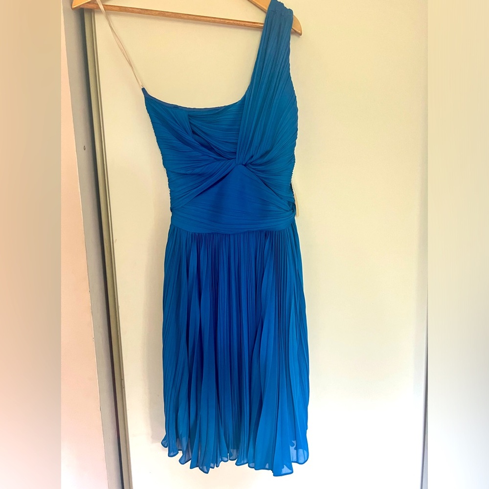 NEW - Never worn, tags on. Blue cocktail dress